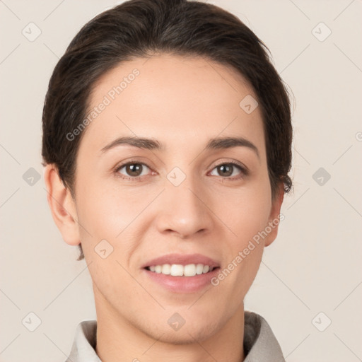 Joyful white young-adult female with short  brown hair and brown eyes