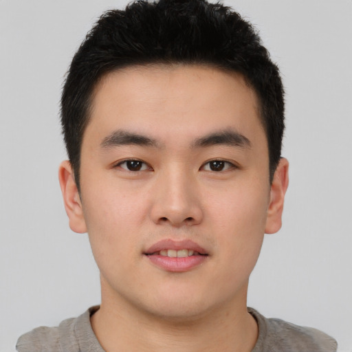 Neutral asian young-adult male with short  brown hair and brown eyes