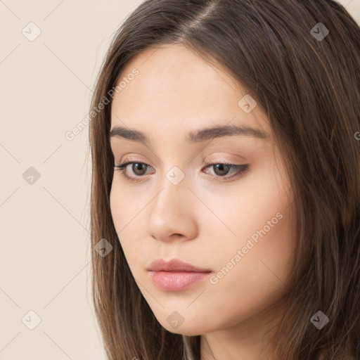 Neutral white young-adult female with long  brown hair and brown eyes