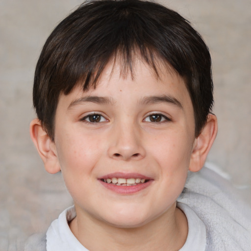 Joyful white child male with short  brown hair and brown eyes