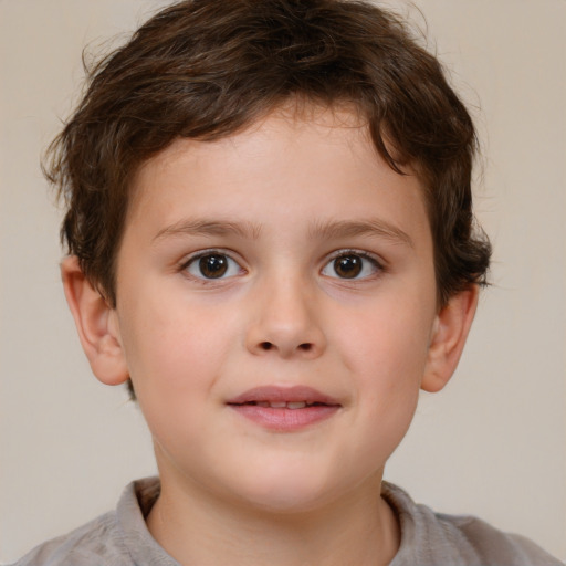 Joyful white child male with short  brown hair and brown eyes