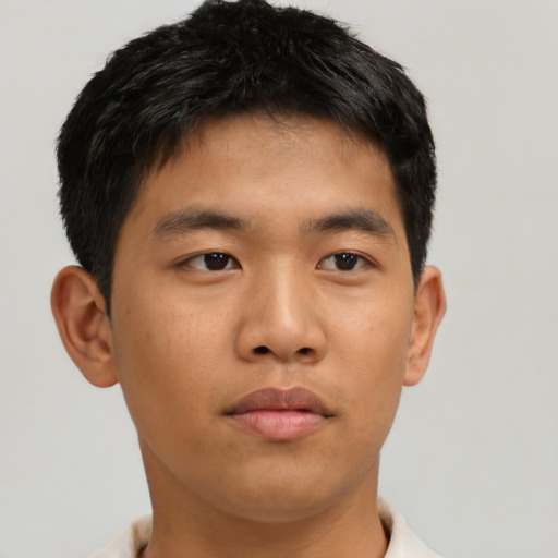 Neutral asian young-adult male with short  brown hair and brown eyes