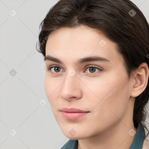 Neutral white young-adult female with medium  brown hair and brown eyes