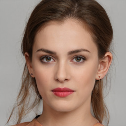 Neutral white young-adult female with medium  brown hair and brown eyes