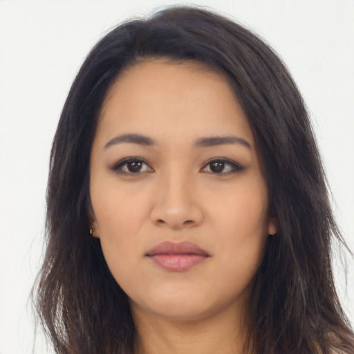 Joyful asian young-adult female with long  brown hair and brown eyes