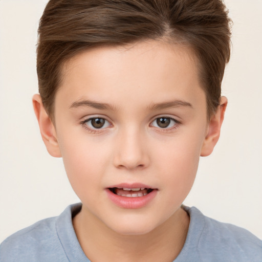 Joyful white child female with short  brown hair and brown eyes