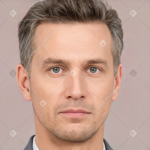 Neutral white adult male with short  brown hair and grey eyes