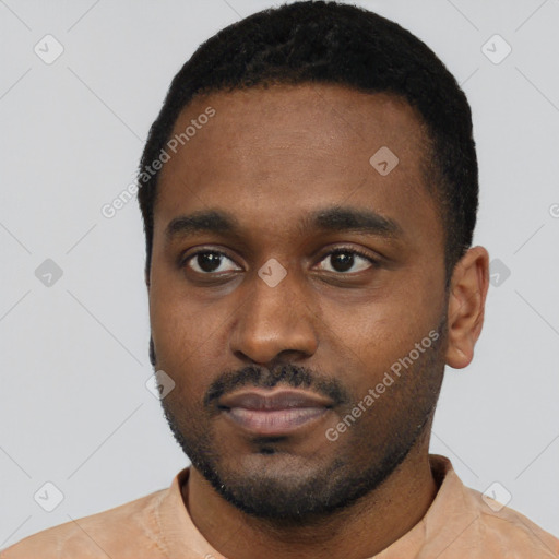 Neutral black young-adult male with short  black hair and brown eyes