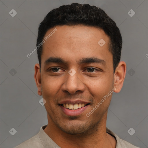 Joyful latino young-adult male with short  black hair and brown eyes