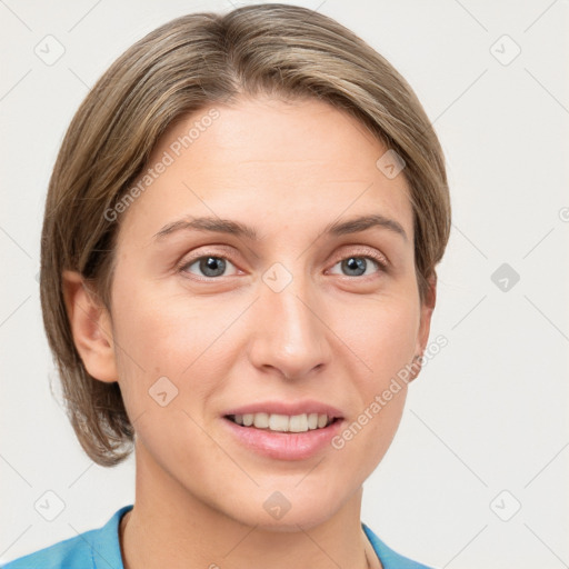 Joyful white young-adult female with short  brown hair and grey eyes