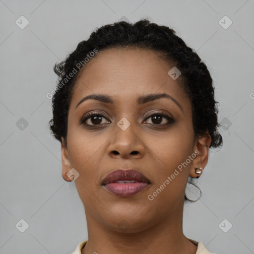 Joyful latino young-adult female with short  black hair and brown eyes