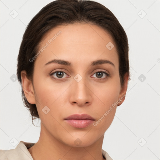 Neutral white young-adult female with short  brown hair and brown eyes