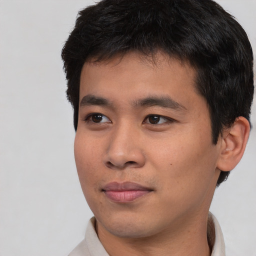 Neutral asian young-adult male with short  black hair and brown eyes
