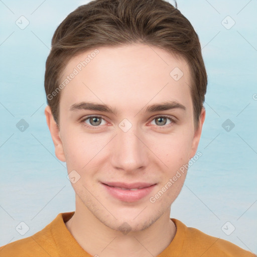 Joyful white young-adult male with short  brown hair and grey eyes