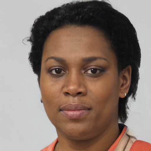 Neutral black young-adult female with short  black hair and brown eyes