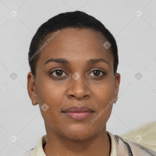 Joyful black young-adult female with short  brown hair and brown eyes