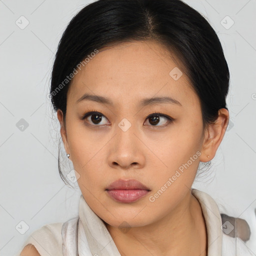 Neutral asian young-adult female with medium  black hair and brown eyes