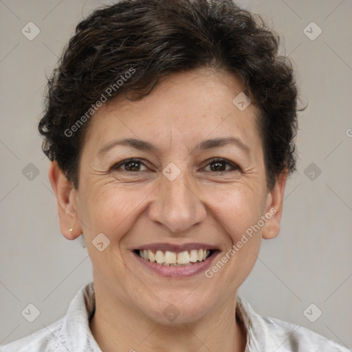 Joyful white adult female with short  brown hair and brown eyes