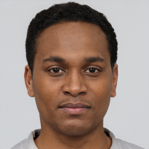 Neutral black young-adult male with short  brown hair and brown eyes