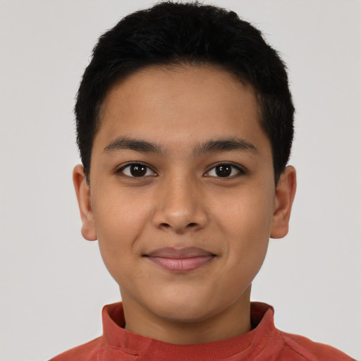 Joyful latino young-adult male with short  brown hair and brown eyes