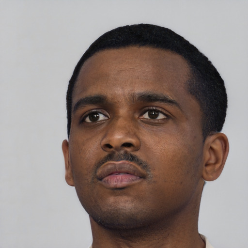 Neutral black young-adult male with short  black hair and brown eyes