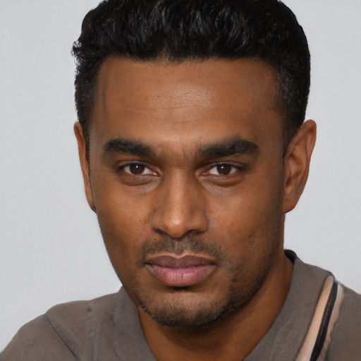 Neutral black young-adult male with short  black hair and brown eyes