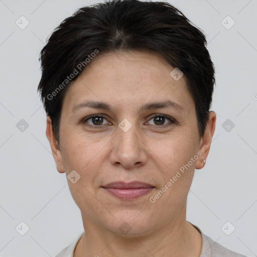 Joyful white adult female with short  brown hair and brown eyes