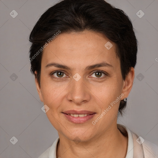 Joyful white adult female with short  brown hair and brown eyes