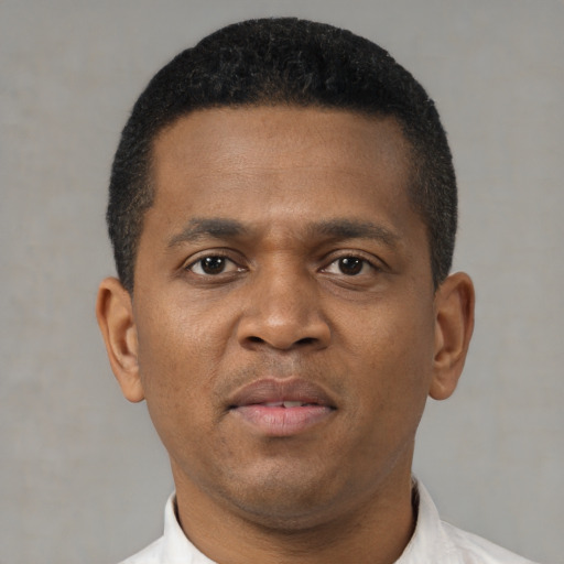 Neutral black young-adult male with short  brown hair and brown eyes