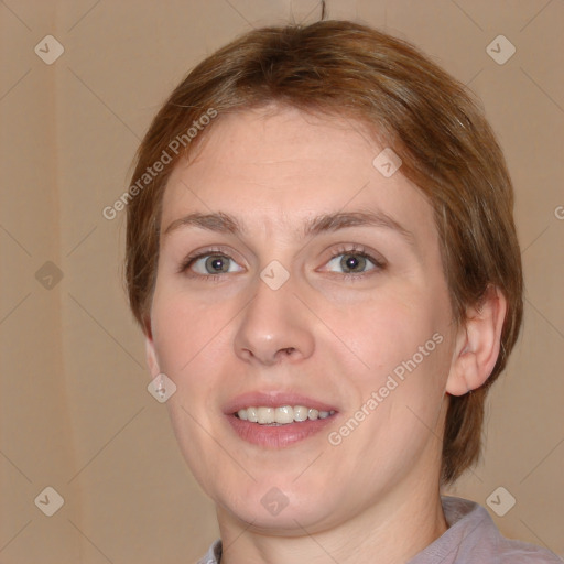 Joyful white young-adult female with medium  brown hair and blue eyes