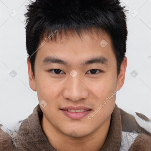 Joyful black young-adult male with short  brown hair and brown eyes
