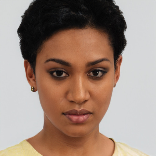 Neutral latino young-adult female with short  black hair and brown eyes