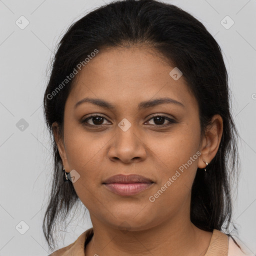 Joyful latino young-adult female with medium  brown hair and brown eyes