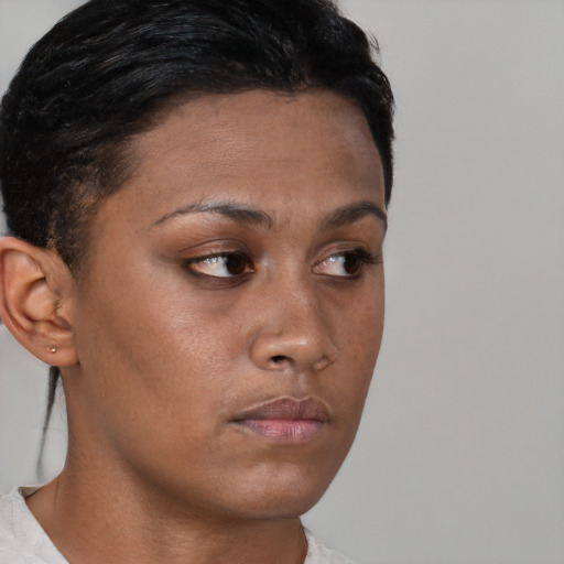 Neutral black young-adult female with short  brown hair and brown eyes