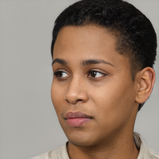 Neutral black young-adult female with short  black hair and brown eyes