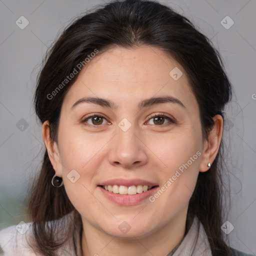 Joyful white young-adult female with medium  brown hair and brown eyes