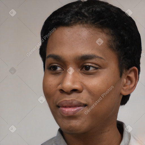 Joyful black young-adult female with short  black hair and brown eyes