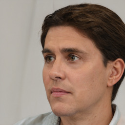 Neutral white adult male with short  brown hair and brown eyes