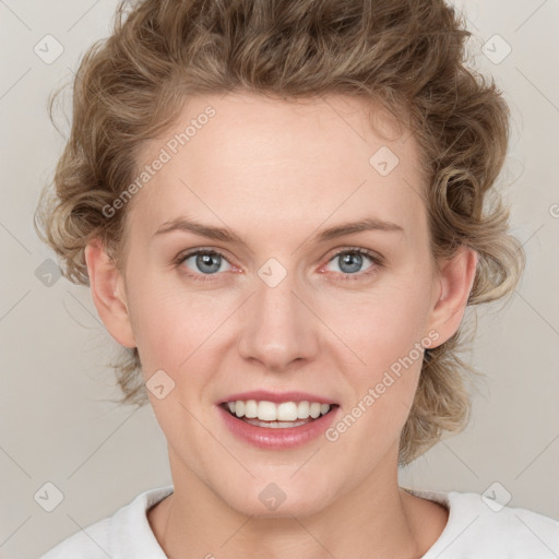 Joyful white young-adult female with medium  brown hair and blue eyes