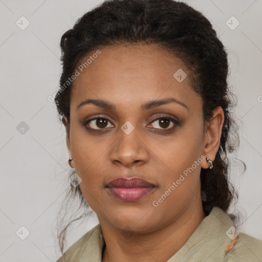 Joyful black young-adult female with medium  brown hair and brown eyes