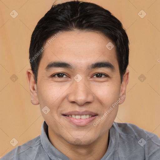 Joyful white young-adult male with short  black hair and brown eyes