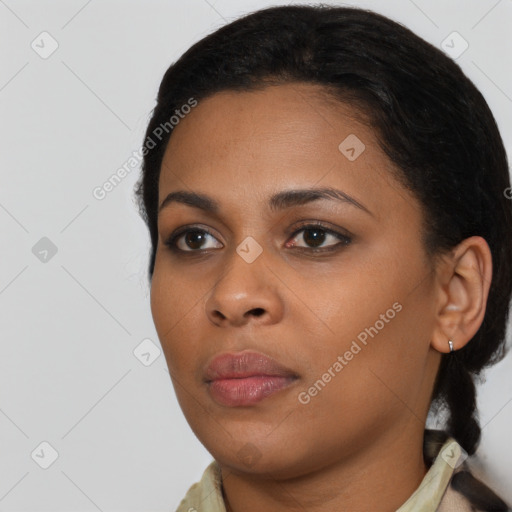 Neutral black young-adult female with short  black hair and brown eyes