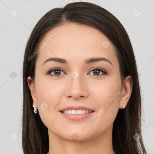 Joyful white young-adult female with long  brown hair and brown eyes