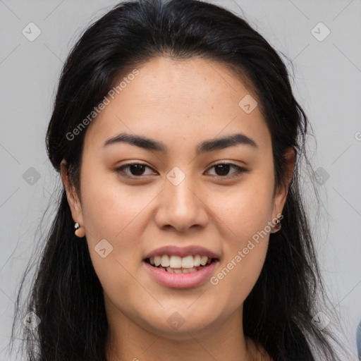 Joyful asian young-adult female with long  brown hair and brown eyes