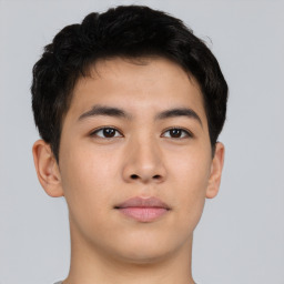 Neutral asian young-adult male with short  brown hair and brown eyes