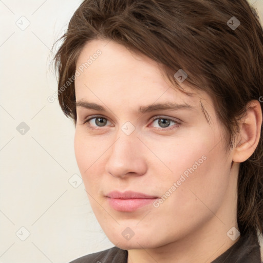 Neutral white young-adult female with medium  brown hair and grey eyes