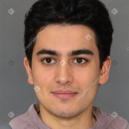 Joyful latino young-adult male with short  black hair and brown eyes