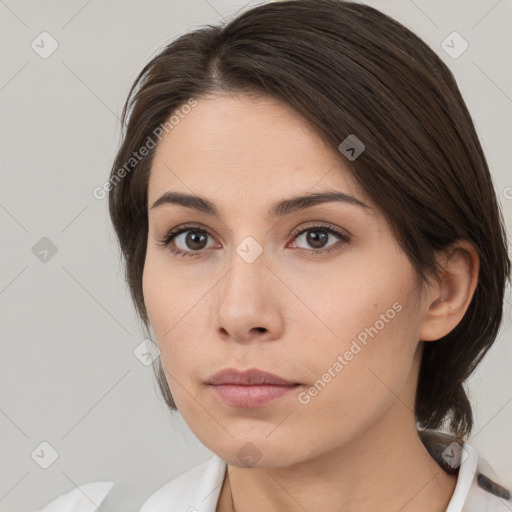 Neutral white young-adult female with medium  brown hair and brown eyes