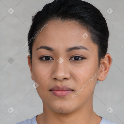 Neutral latino young-adult female with short  black hair and brown eyes