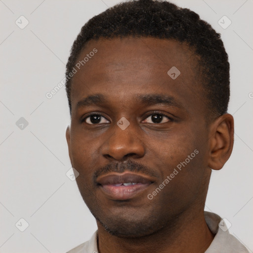 Neutral black young-adult male with short  brown hair and brown eyes